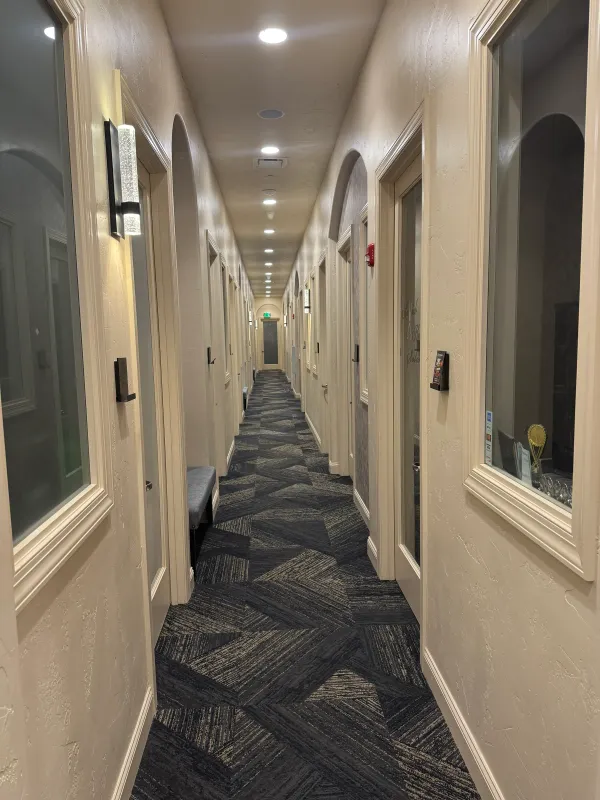 The hallway of private suites that leads to Suite 334