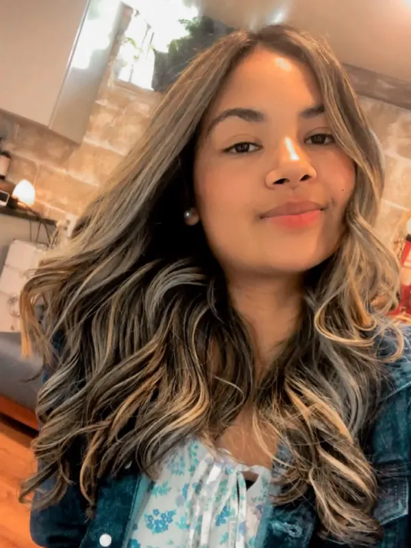 Brunette balayage kept cool, painted to open as the waves fall