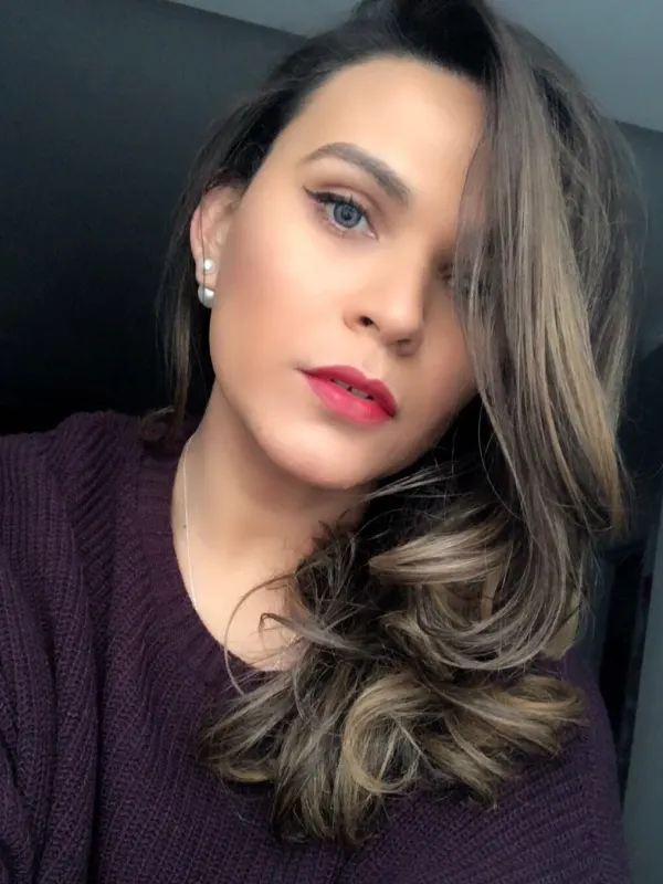 Mocha brown with an ash blonde face frame, set in a deep side wave