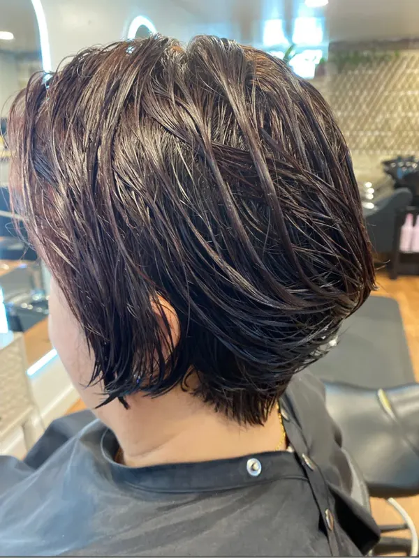 Textured bob cut short at the nape and left to fall forward