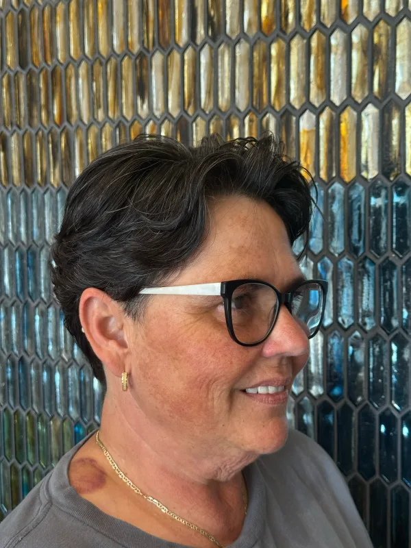 The same pixie from the side, the top left long enough to sweep back