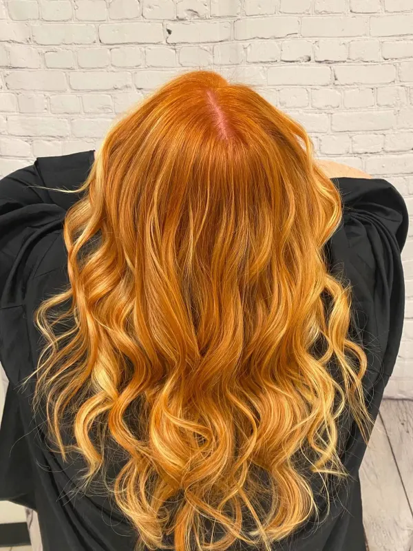 Vivid copper carried the full length, seen from the back
